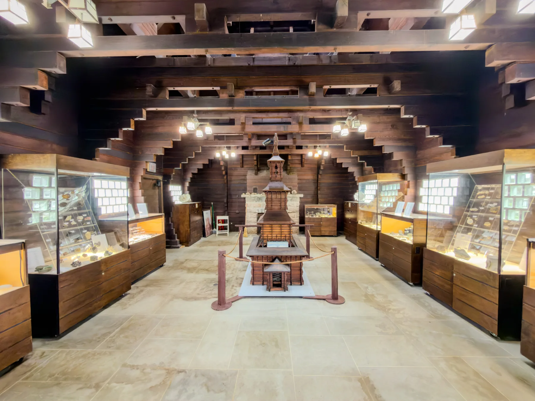 Interior of the Redwood Building with redwood beams and display cases
