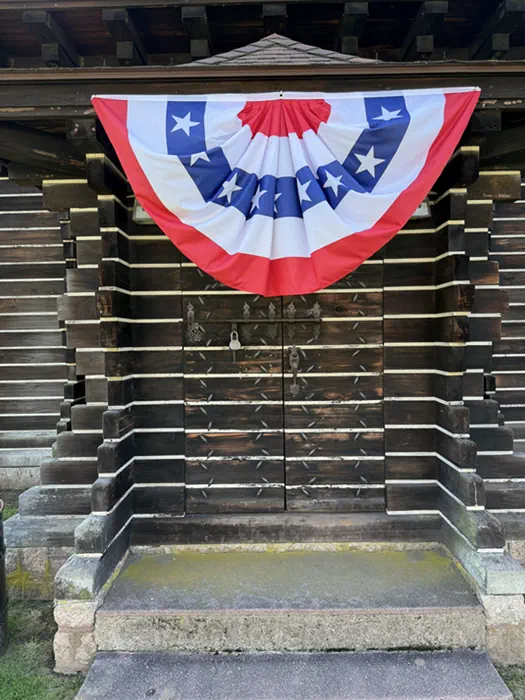 Redwood Building entrance decorated with patriotic bunting