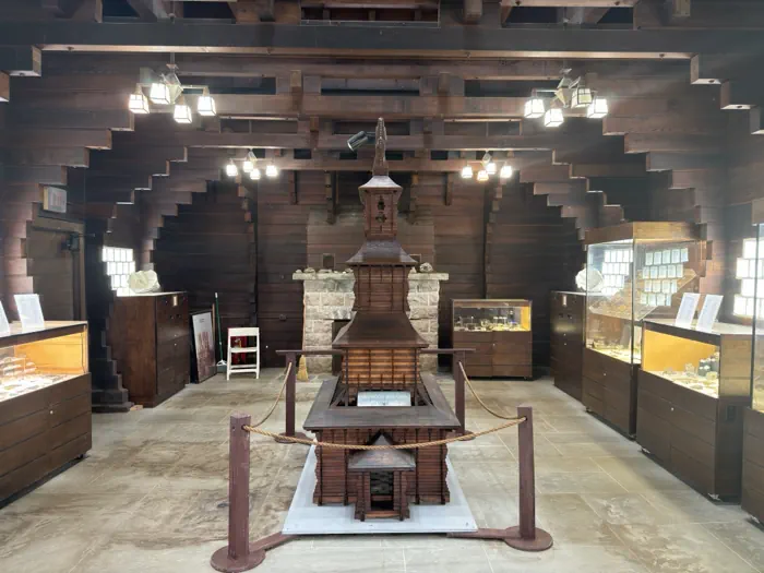 Redwood Building interior with its central architectural model and exhibit cases