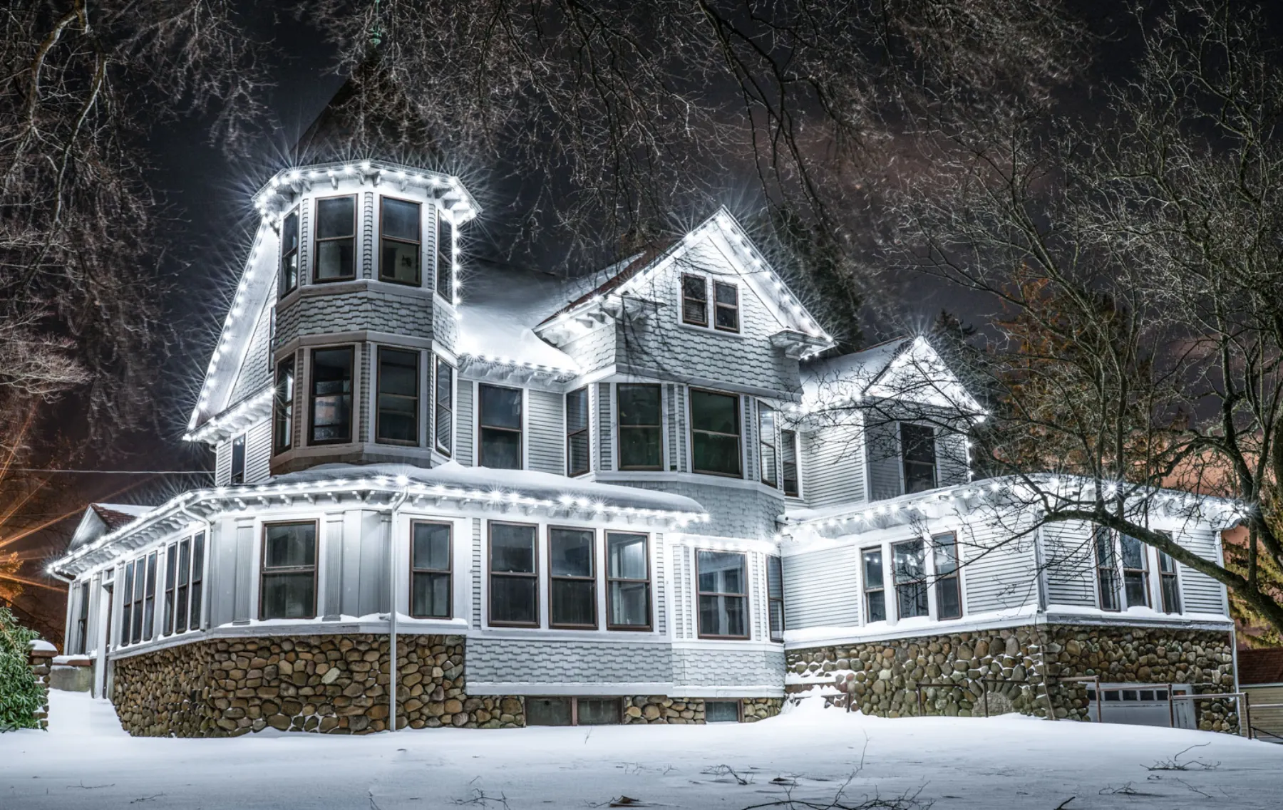 Stephen Boothe House illuminated after snowfall
